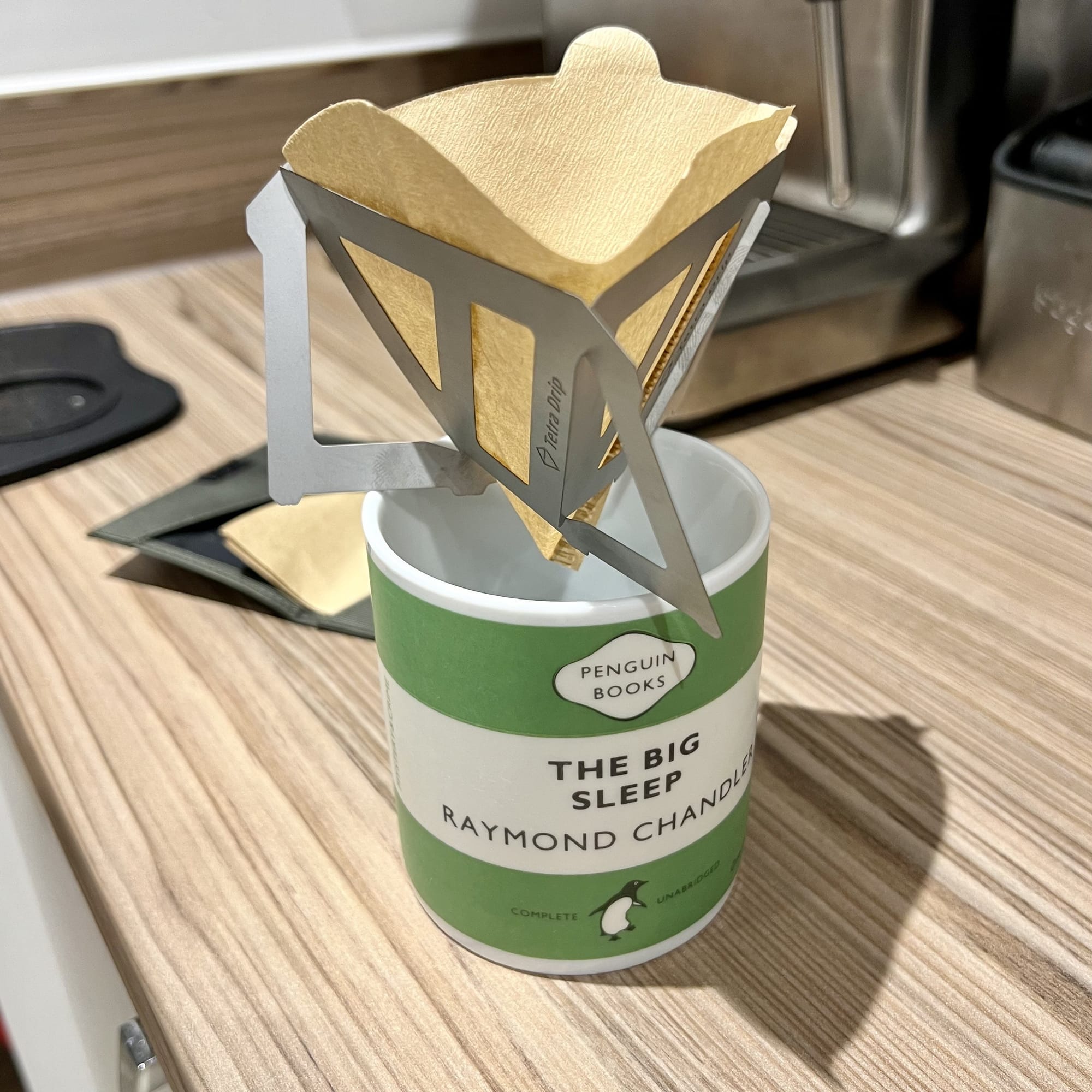 Tetra Drip assembled and sat on top of a mug with a paper coffee filter in it