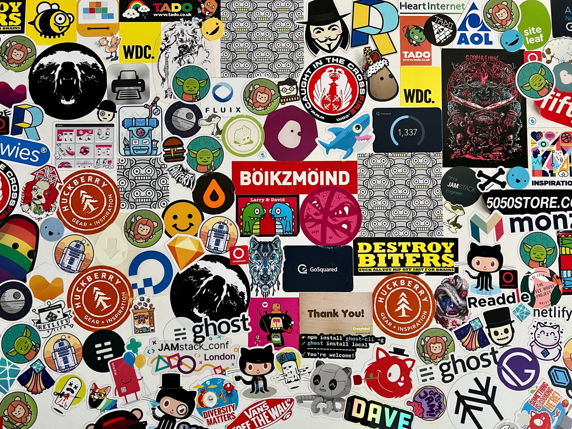 Close up of the desk with stickers which fill the view